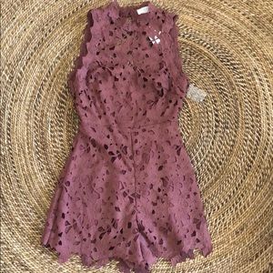 ASTR the cutest romper and has an open back